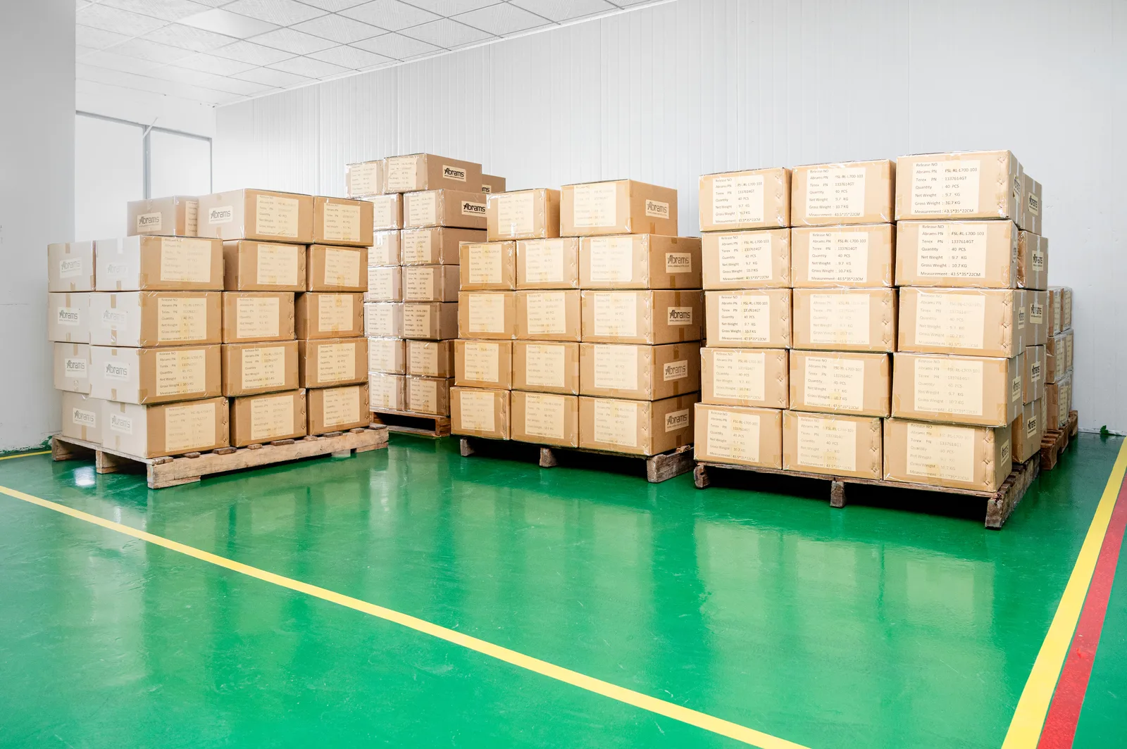 Finished goods stored on pallet racking inside a warehouse aisle