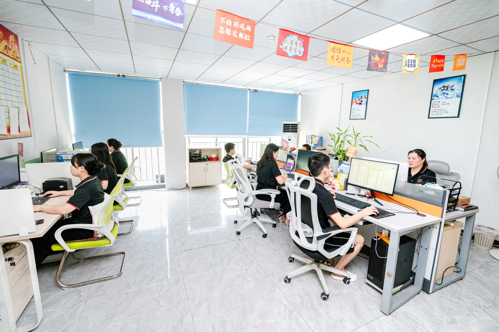 XRLL open-plan office with sales team working