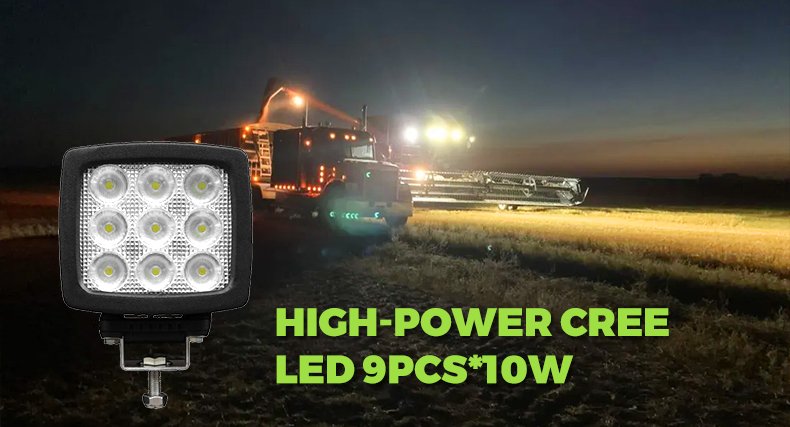 Tractor ROPS light bracket clamped to the roll-over protection structure without drilling